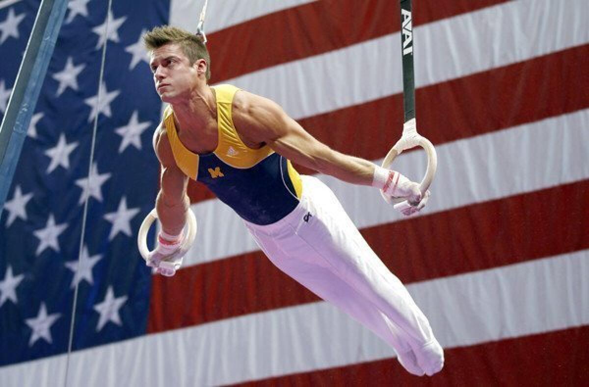 Sam Mikulak competes on the rings during the U.S. men's national gymnastics championships on Sunday in Hartford, Conn.