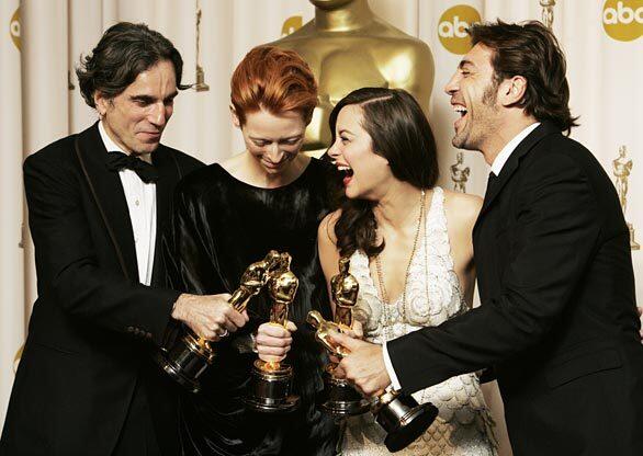 The winners of the four major acting awards celebrate in the photo room at the 80th annual Academy Awards. From left: Daniel Day-Lewis, winner of best actor for his role in There Will Be Blood; Tilda Swinton, best supporting actress, Michael Clayton; Marion Cotillard, best actress, La Vie en Rose; and Javier Bardem, best supporting actor, No Country for Old Men.