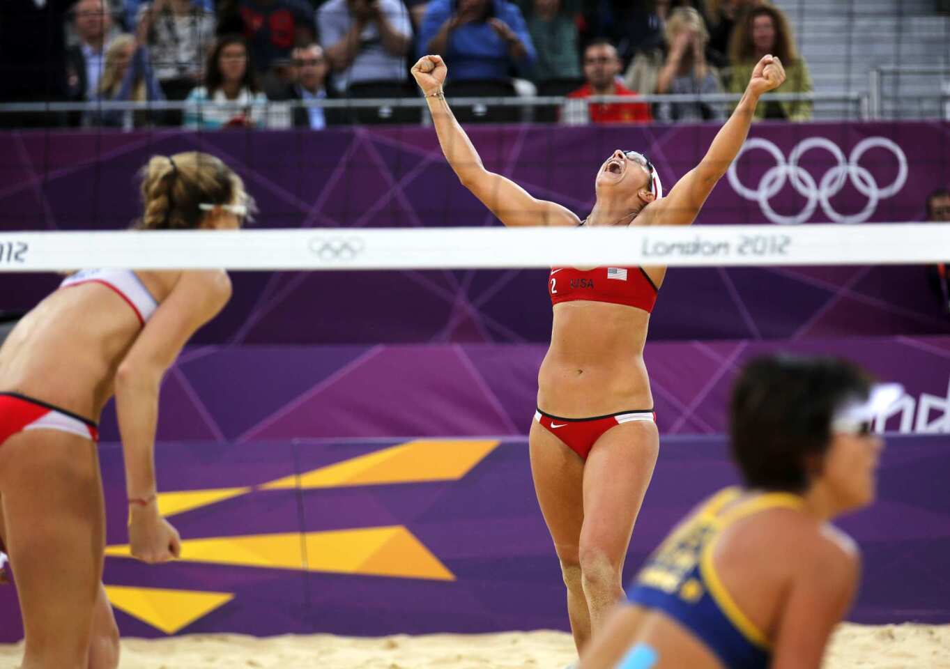 United States' Misty May-Treanor celebrates the final point and victory as the U.S. beat China in beach volleyball.