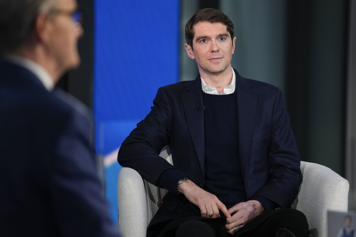 Fox News reporter Benjamin Hall appears during a segment on "Fox and Friends" in New York on Friday, March 10, 2023. Hall's book "Saved: A War Reporter's Mission to Make It Home," was released on Tuesday. (AP Photo/Seth Wenig)