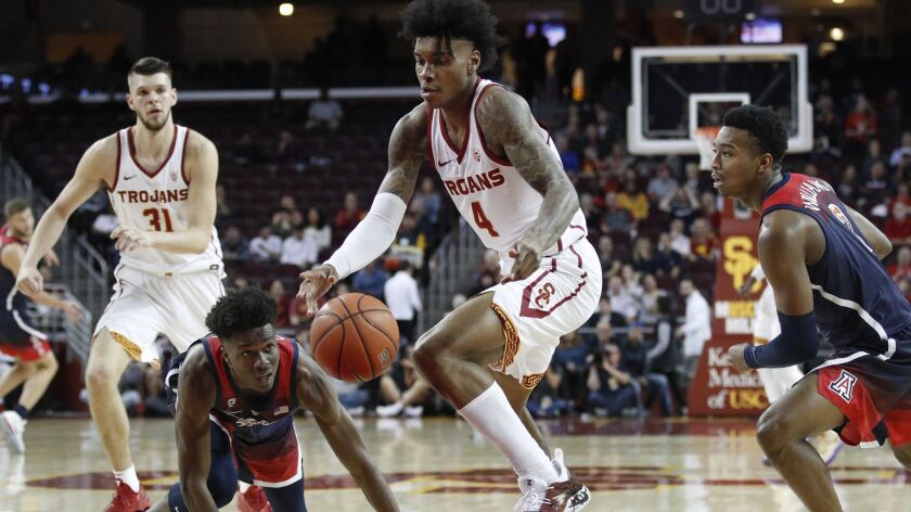 USC's Kevin Porter Jr. gets a loose ball after the Trojans' defense forced a turnover against Arizona on Thursday.