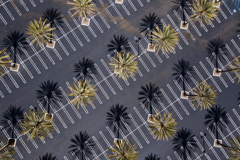 An empty shopping mall parking lot in San Diego is shown here on March 25, 2020.