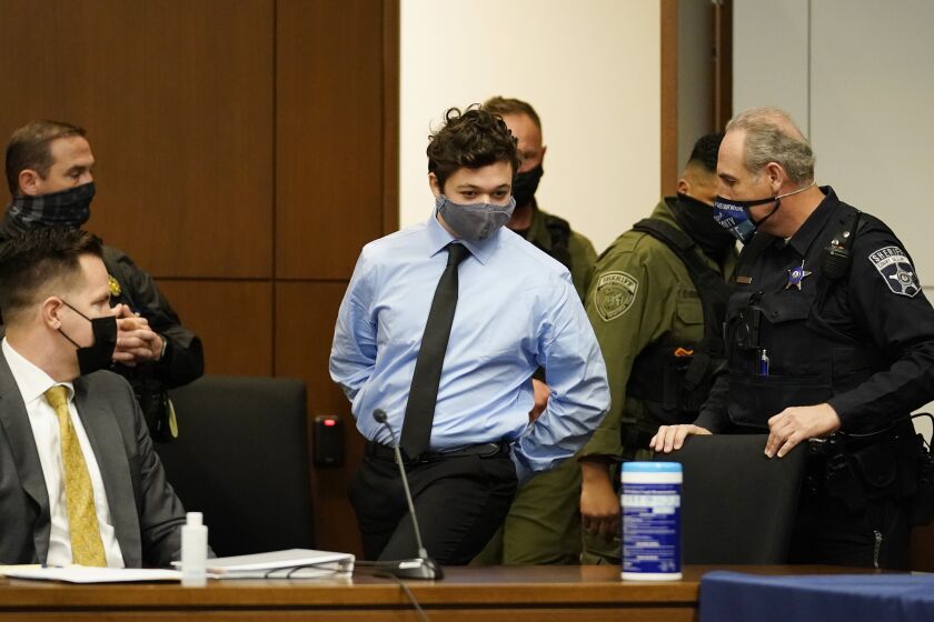 Kyle Rittenhouse appears for an extradition hearing in Lake County court Friday, Oct. 30, 2020, in Waukegan, Ill. The 17-year-old is accused of killing two demonstrators in Kenosha, Wis., on Aug. 25, 2020, two days after a police officer trying to arrest Jacob Blake shot him seven times in the back, paralyzing him from the waist down. (AP Photo/Nam Y. Huh, Pool)