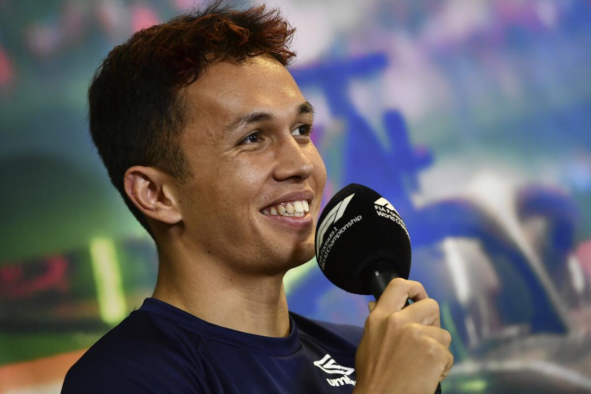 Williams driver Alexander Albon of Thailand attends a news conference at the Hungaroring racetrack in Mogyorod, near Budapest, Hungary, Thursday, July 28, 2022. The Hungarian Formula One Grand Prix will be held on Sunday. (AP Photo/Anna Szilagyi)