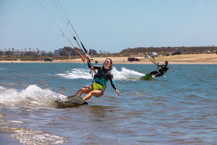 Mercedes Echanove and Evan Purcell to kite surf on Mission Bay.