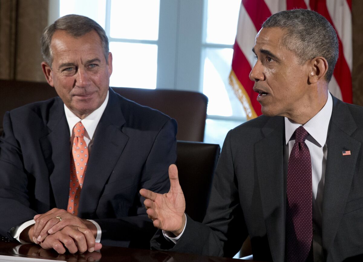 House Speaker John Boehner of Ohio and President Obama during a meeting in the Cabinet Room of the White House in Washington.