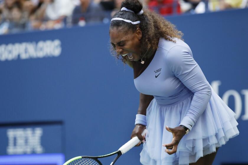 Serena Williams reacts after a point against Kaia Kanepi, of Estonia, during the fourth round of the U.S. Open tennis tournament, Sunday, Sept. 2, 2018, in New York. (AP Photo/Carolyn Kaster)