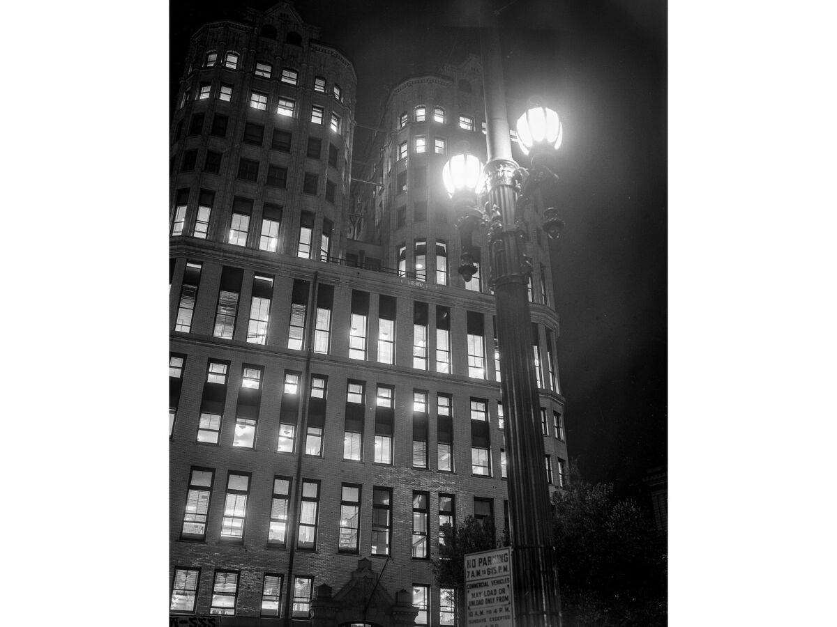 December 1955: Nighttime image of Los Angeles old Hall of Records from Spring Street side.