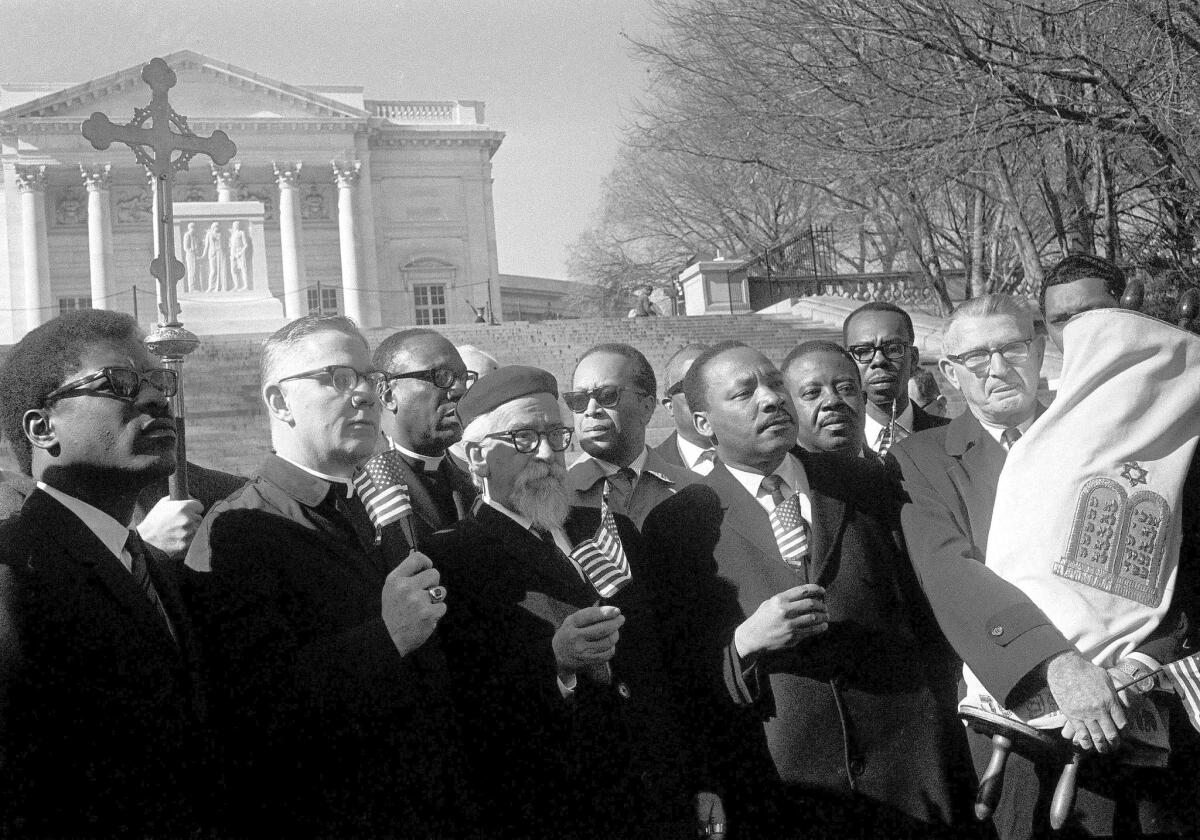 Leaders in a Vietnam war protest&mdash;including Rabbi Abraham Heschel, front row, center&mdash;stand in silent prayer at Arlington National Cemetery on Feb. 6, 1968.