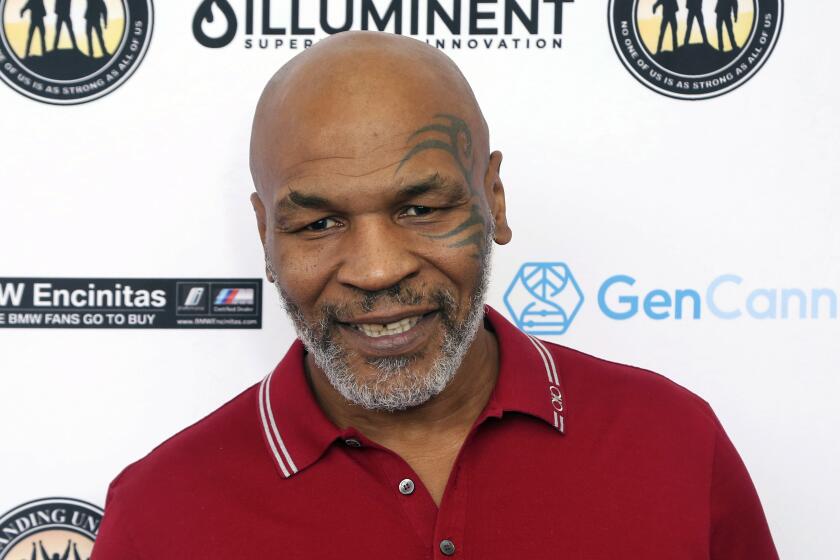 FILE - Mike Tyson attends a celebrity golf tournament in Dana Point, Calif., Aug. 2, 2019. 