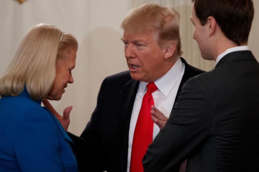IBM CEO Ginni Rometty listens to President Trump talk during a meeting earlier this month while his advisor and son-in-law, Jared Kushner, looks on. Maybe Rometty got combat pay for enduring this harangue?