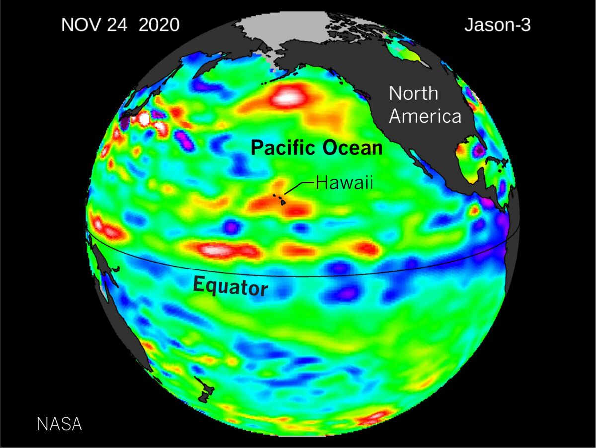 An illustration of the Earth with blue shading along the equator showing the strength of the La Niña in the eastern Pacific.