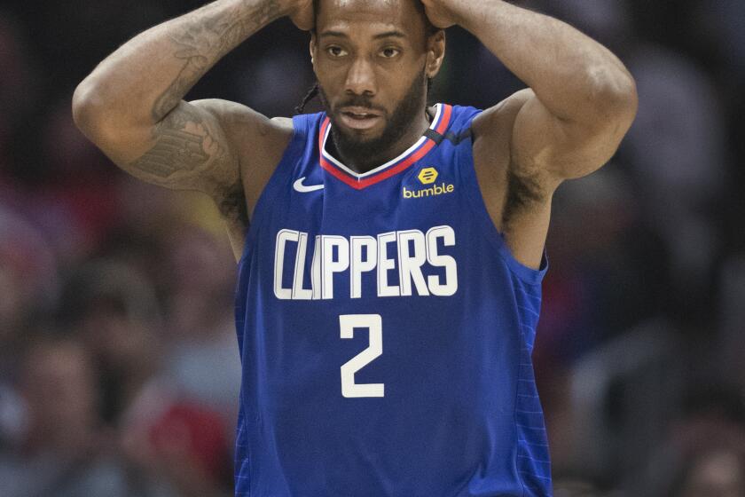 LOS ANGELES, CALIF. -- SATURDAY, JANUARY 4, 2020: Clippers forward Kawhi Leonard shows his frustration after a failed drive against the Memphis Grizzlies during their 140-114 loss to the Grizzlies at the Staples Center in Los Angeles, Calif., on Jan. 4, 2020. (Allen J. Schaben / Los Angeles Times)