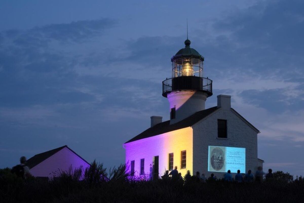 Dressed for the occasion, The Old Point Loma Lighthouse was lit in purple and gold for the Centennial of the 19th Amendment. 