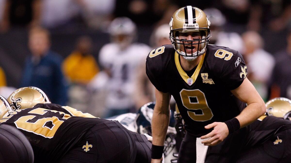 Drew Brees #9 of the New Orleans Saints during the NFC divisional playoff game at the Superdome on January 13, 2007.