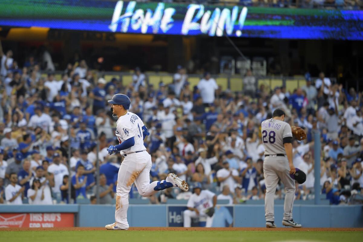 Dodgers right fielder Joc Pederson runs the bases after hitting a three-run home run.