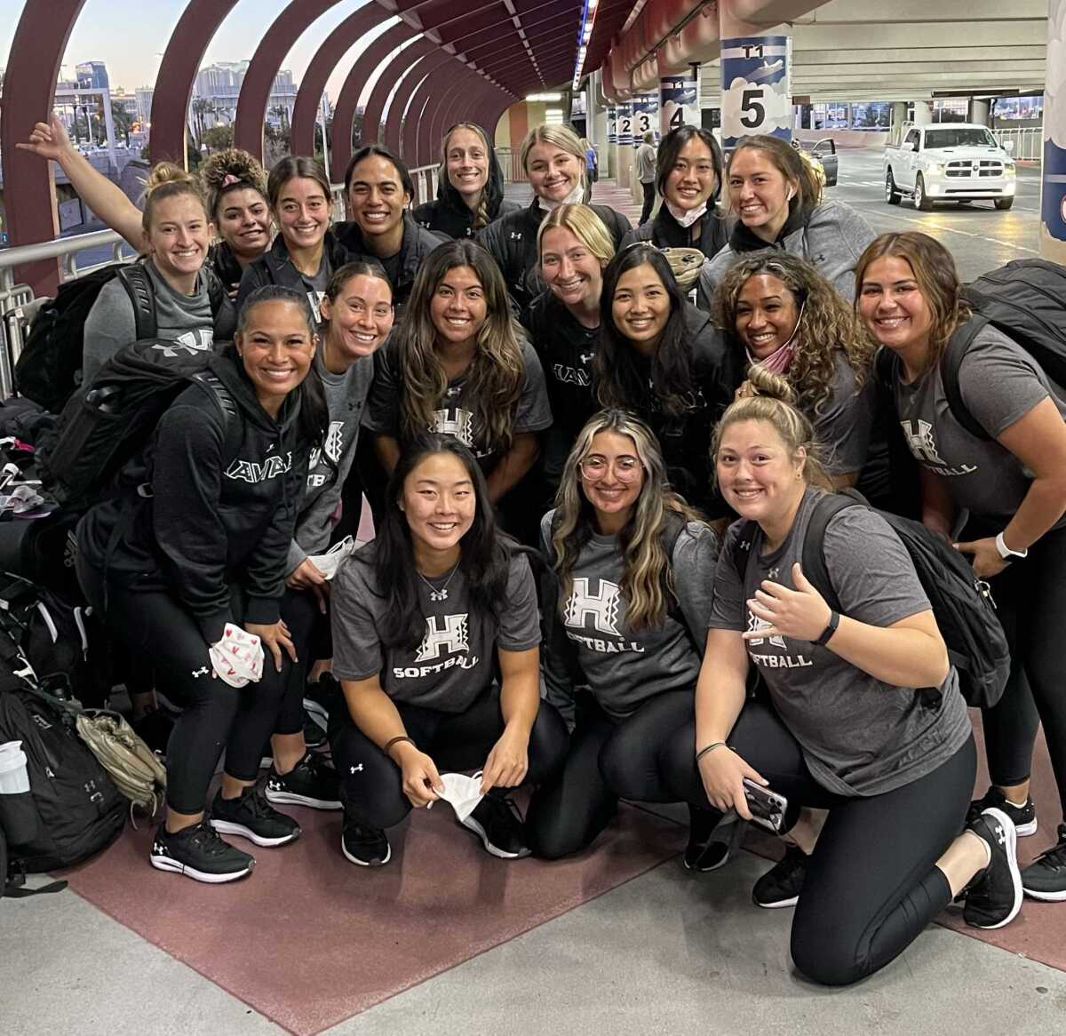 Hawaii softball players pose for a team photo during a road trip last season.