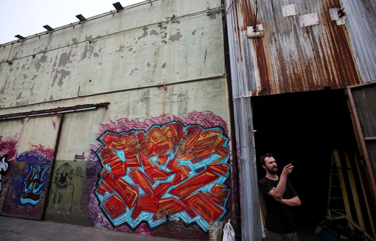 Eric Land, a welder by trade, rents work space in a warehouse on Naud Street in Los Angeles where the property owner has served eviction notices to tenants in the wake of the deadly warehouse fire in Oakland.