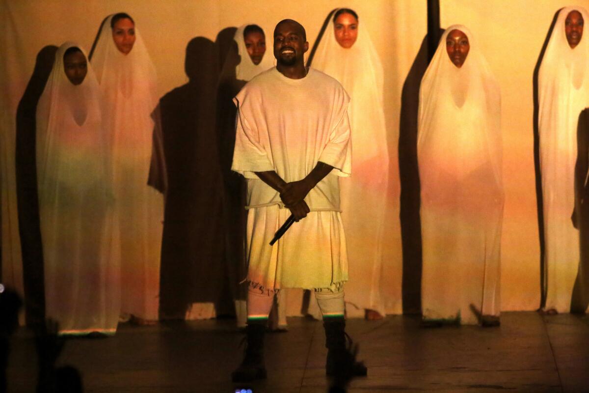 Kayne West soaks up applause after performing "Welcome to Heartbreak" from his 2008 studio album "808s & Heartbreak" at the Hollywood Bowl on Sept. 25, 2015.