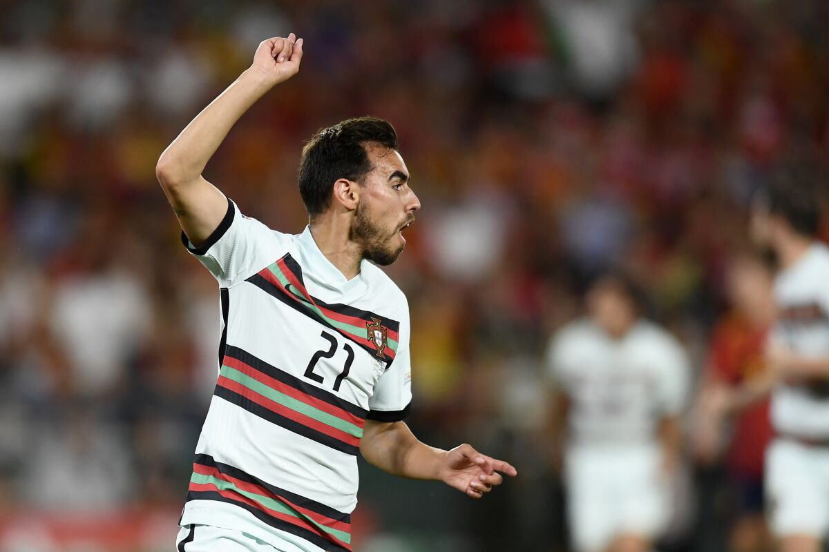 Portugal's Ricardo Horta celebrates after scoring his side's first goal during the UEFA Nations League soccer match between Spain and Portugal, at the Benito Villamarin Stadium, in Seville, Spain, Thursday, June 2, 2022. (AP Photo/Jose Breton)