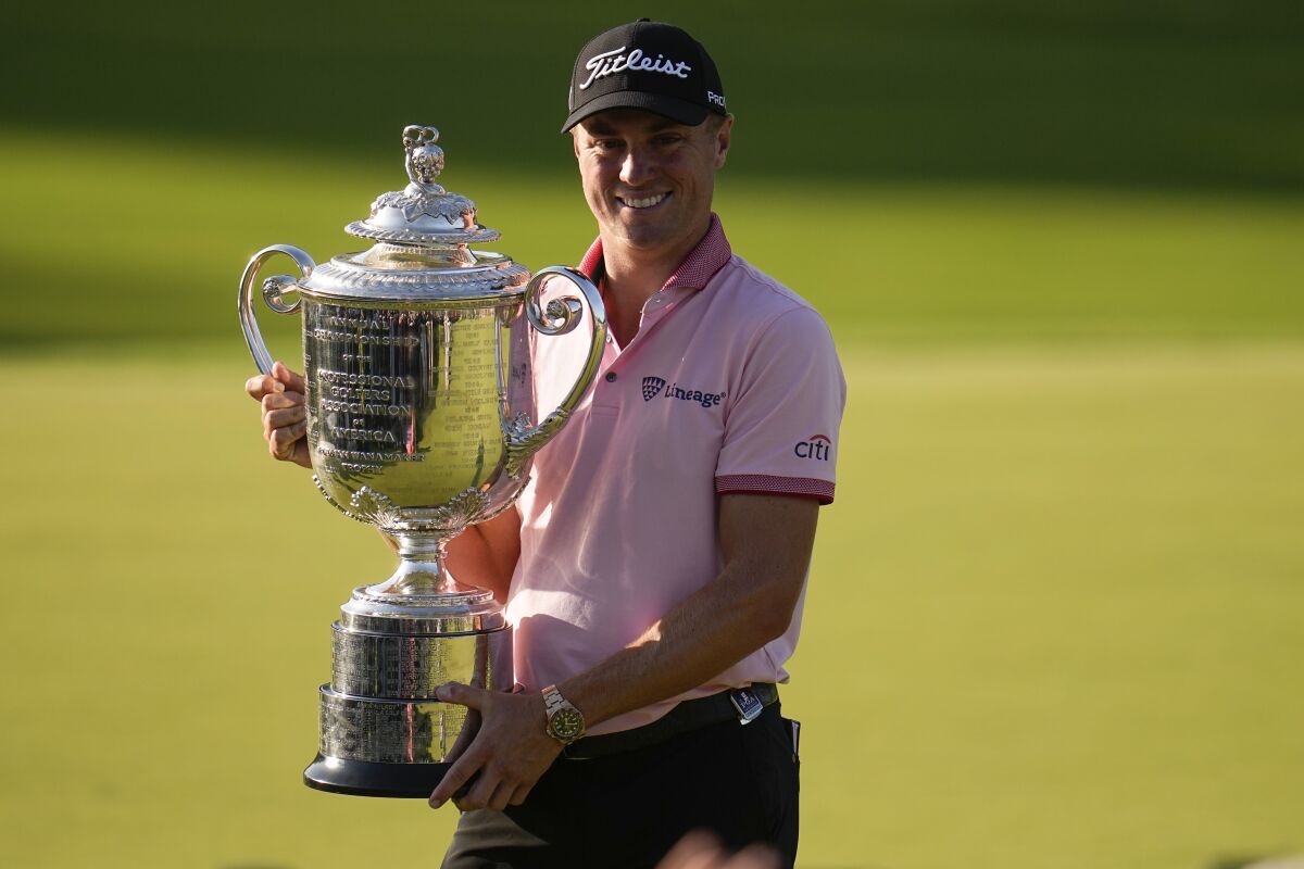 Justin Thomas holds the Wanamaker Trophy after winning the PGA Championship.