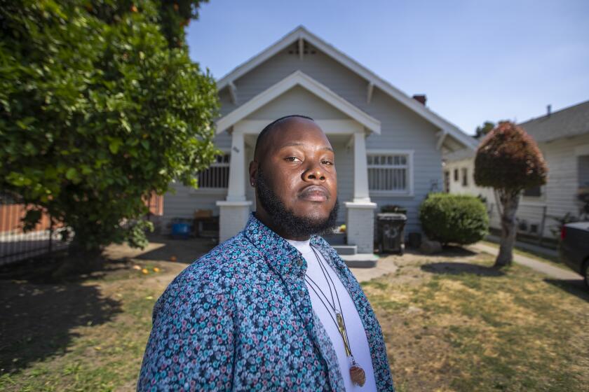 LOS ANGELES, CA - JUNE 04: Trusion Daniels, shown at his Los Angeles apartment, previously worked as a chef at LAX but has been laid off due to the coronavirus pandemic. Photo taken Thursday, June 4, 2020 in Los Angeles, CA. (Allen J. Schaben / Los Angeles Times)