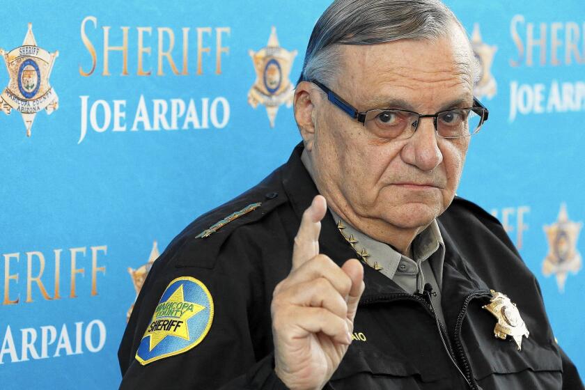 Maricopa County Sheriff Joe Arpaio, shown in 2013, has acknowledged that he violated federal court orders in a racial profiling case.