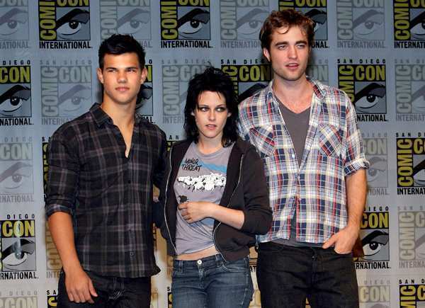Taylor Lautner gets his moment to shine with the advent of "New Moon," directed by Chris Weitz, and his stepped-up role of Jacob Black, but heat still centers on the romance between Rob and Kristen. The cast is shown here at the 2009 Comic-Con panel for the sequel.