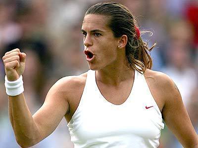 Amelie Mauresmo of France celebrates a point during her match against Serena Williams.