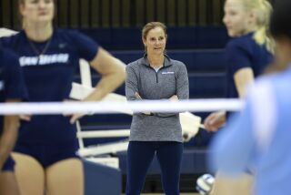 San Diego, CA - November 28: USD women's volleyball coach Jennifer Petrie looks on during a practice on Monday, November 28, 2022. (K.C. Alfred / The San Diego Union-Tribune)