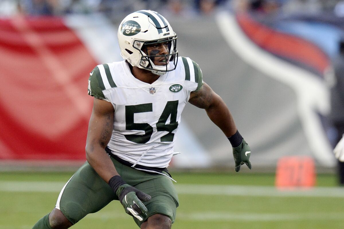 FILE - In this Dec. 2, 2018, file photo, New York Jets linebacker Avery Williamson plays against the Tennessee Titans in the first half of an NFL football game in Nashville, Tenn. Williamson is on the Jets' physically unable to perform list but is close to being cleared to practice in camp. He could end up being a key contributor this year (AP Photo/Mark Zaleski, File)