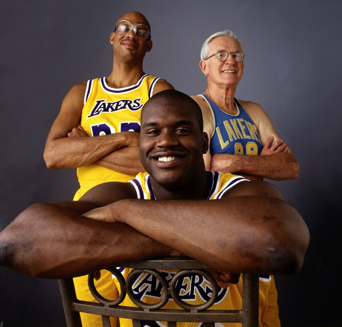 Shaquille O'Neal poses with Laker greats Kareem Abdul-Jabbar and George Mikan in 1996.