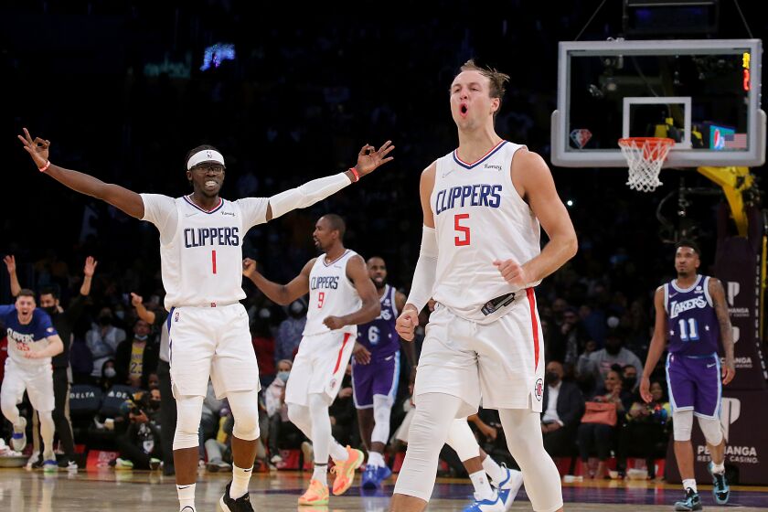 LOS ANGELES, CALIF. - DEC. 3, 2021. Clippers guard Luke Kennard (5) celebrates after hitting a three-pointer.