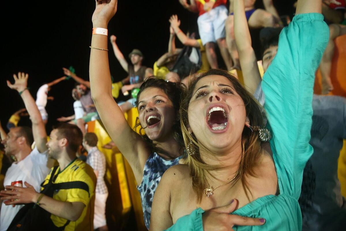 Brazilians celebrate the first goal by South Korea during their World Cup game on June 17.