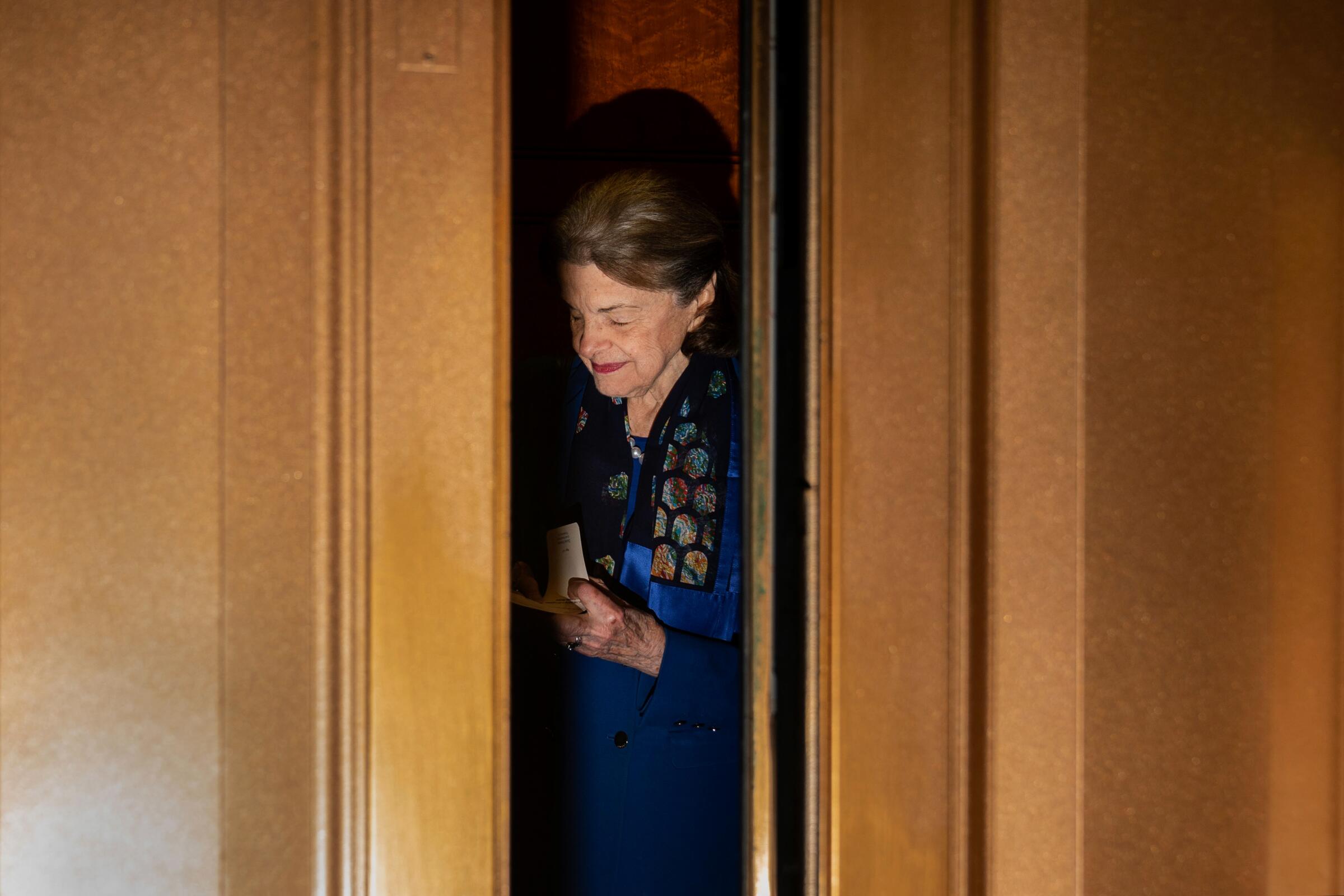 A picture of Sen. Dianne Feinstein exiting the Senate chamber in February.
