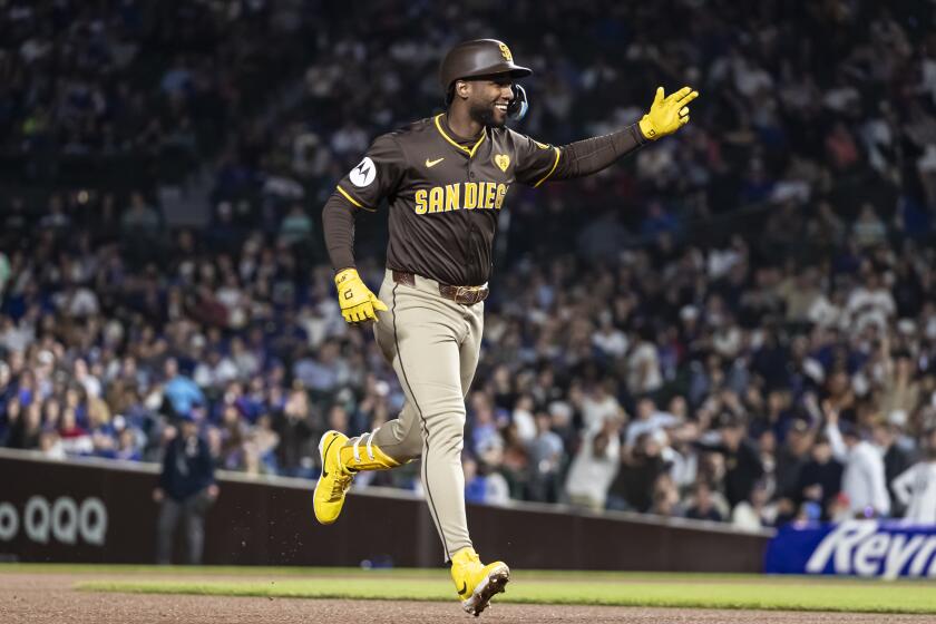 CHICAGO, ILLINOIS - MAY 07: Jurickson Profar #10 of the San Diego Padres rounds the bases for a two-run home run in the eighth inning against the Chicago Cubs at Wrigley Field on May 07, 2024 in Chicago, Illinois. (Photo by Griffin Quinn/Getty Images)