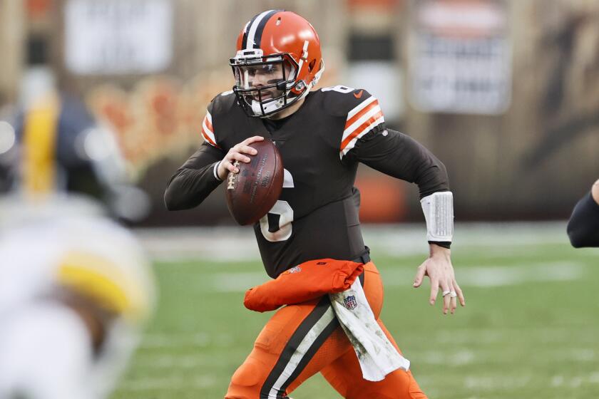 Cleveland Browns quarterback Baker Mayfield (6) scrambles during the second half.