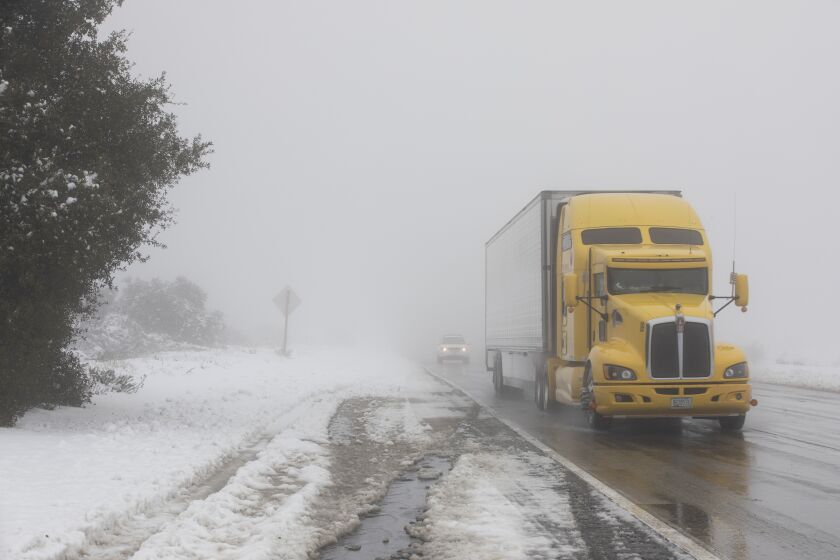 San Diego, CA - February 23: Vehicles drive at a reduced speed on Interstate 8 near Pine Valley after severe weather on Thursday, Feb. 23, 2023. (Ana Ramirez / The San Diego Union-Tribune)