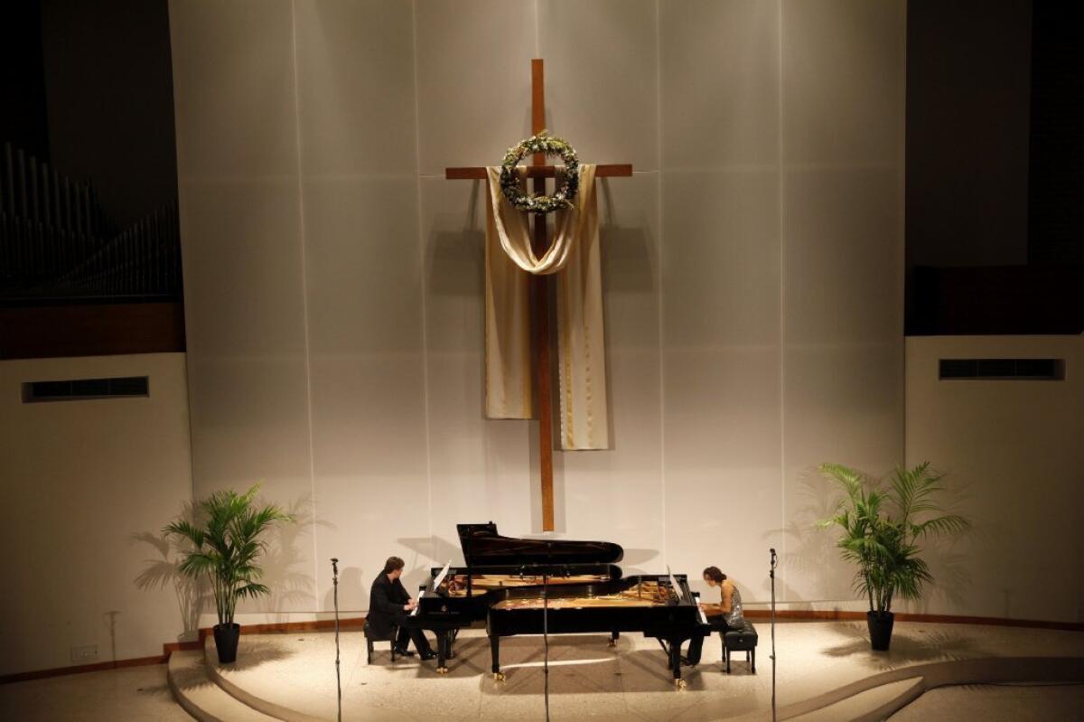 Pianists Liam Viney, left, and Anna Grinberg open the Jacaranda Britten Festival at First Presbyterian Church in Santa Monica on April 7.