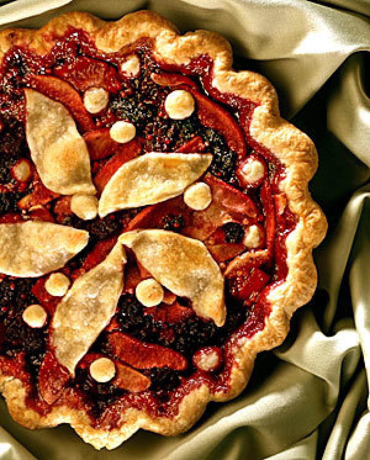 When you're bringing dessert for Thanksgiving, pie is a great way to go. Recipe: Pear-blackberry pie