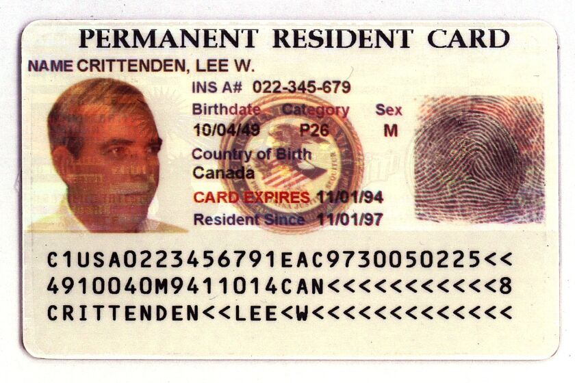 An example of the new "Green Card" issued by the Immigration and Naturalization Service is seen in an undated handout photo. The new card, said to be counterfeit-resistent, incorporates a myriad of security features, including digital images, holograms, micro-printing, and an optical memory stripe, is issued to lawful permanent residents as evidence of their authorization to live and work in the U.S. (AP Photo/Khue Bui)