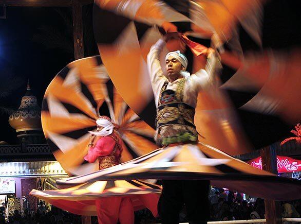 Whirling dervishes perform at a club in the Red Sea resort of Sharm el Sheik in Egypt.