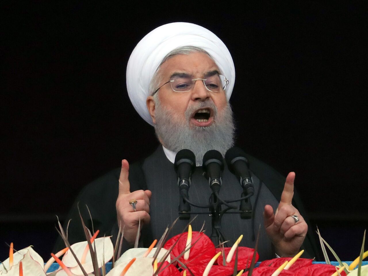 Iranian President Hassan Rouhani delivers his speech during a ceremony marking the 40th anniversary of the 1979 Islamic Revolution, at the Azadi (Freedom) square in Tehran.
