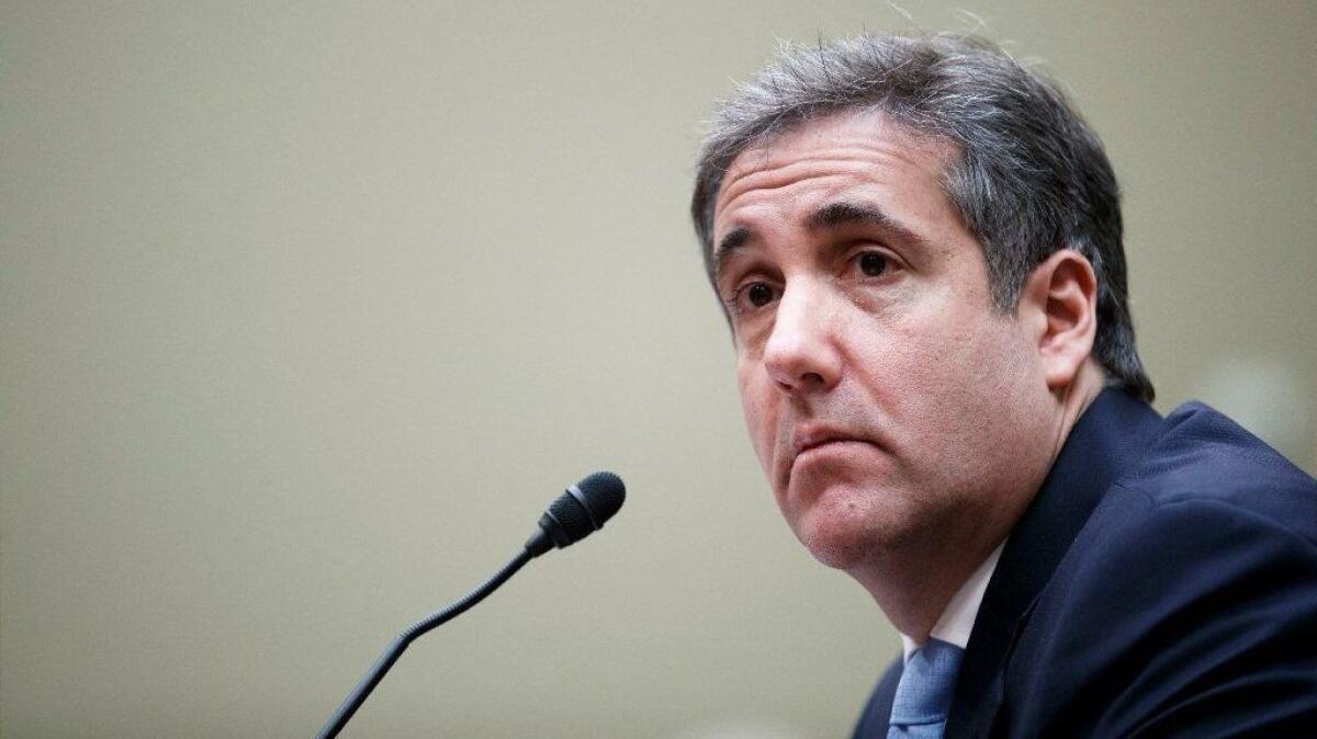Michael Cohen, former personal attorney to President Trump, testifies before the House Oversight and Reform Committee in Washington on Wednesday.
