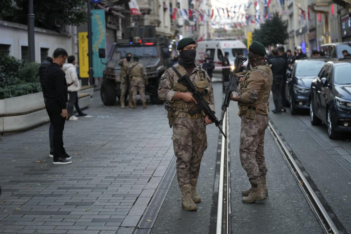 Security and ambulances at the scene after an explosion on Istanbul's popular pedestrian Istiklal Avenue.