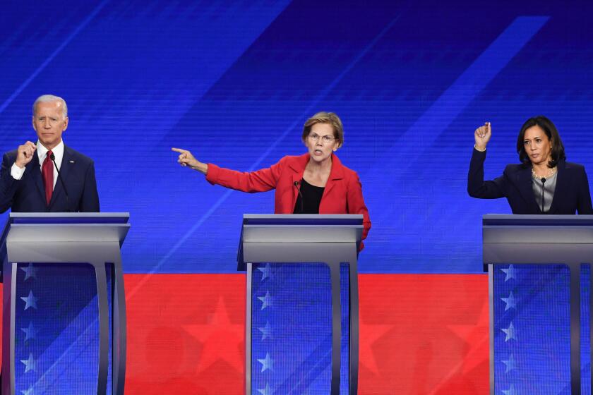 Democratic presidential hopefuls Former Vice President Joe Biden (L), Massachusetts Senator Elizabeth Warren (C) and California Senator Kamala Harris (R) speak during the third Democratic primary debate of the 2020 presidential campaign season hosted by ABC News in partnership with Univision at Texas Southern University in Houston, Texas on September 12, 2019. (Photo by Robyn BECK / AFP) (Photo credit should read ROBYN BECK/AFP/Getty Images)