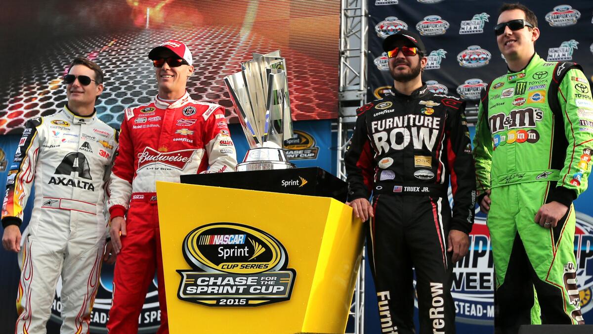 NASCAR drivers (from left) Jeff Gordon, Kevin Harvick, Martin Truex Jr. and Kyle Busch pose next to the Chase for the Sprint Cup trophy before Sunday's finale at Homestead-Miami Speedway.