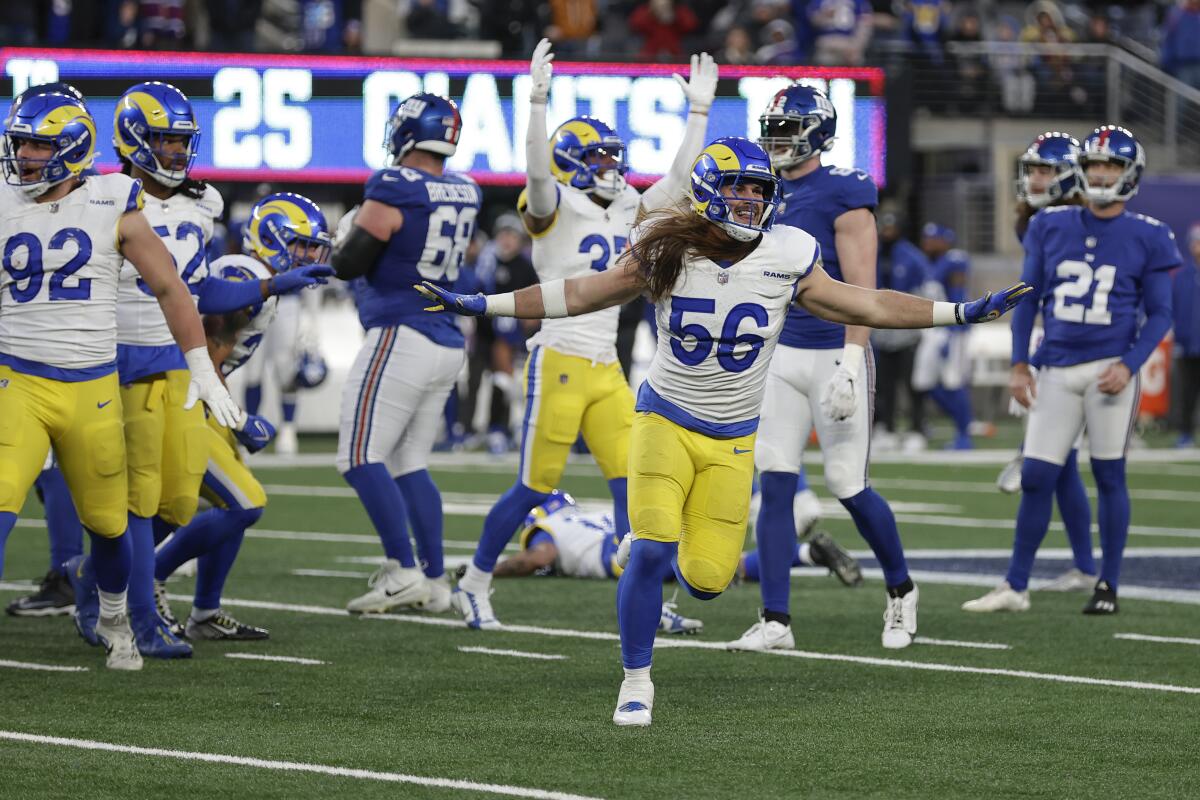 The Rams celebrate after the Giants' Mason Crosby (21) missed a potential game-winning 54-yard field goal.