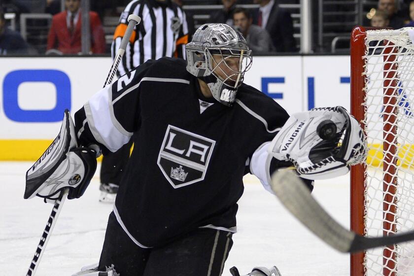 Kings goalie Jonathan Quick makes a save during a preseason win over the Ducks on Tuesday.