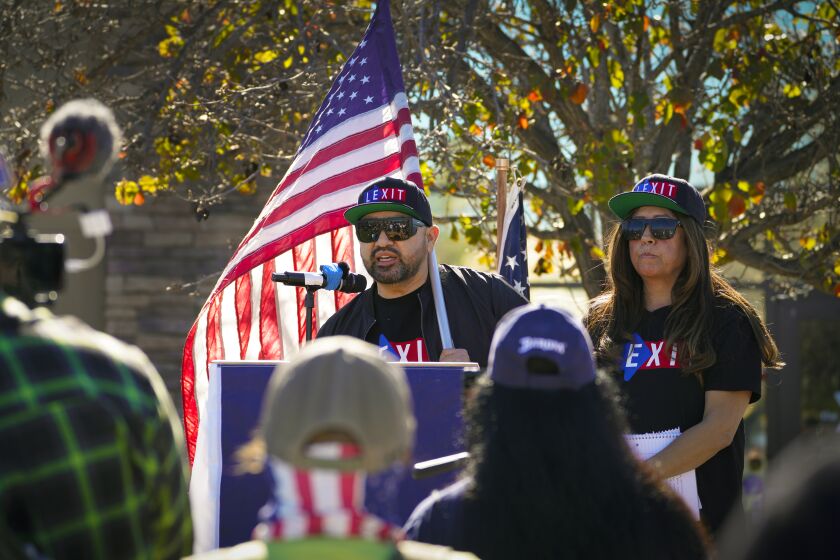 Santee, CA - January 21: Carlos and Alicia with eh LEXIT Movement were among the speakers at a demonstration held in parking lot of at the Cameron Family YMCA on Saturday, Jan. 21, 2023 in Santee, CA. (Nelvin C. Cepeda / The San Diego Union-Tribune)